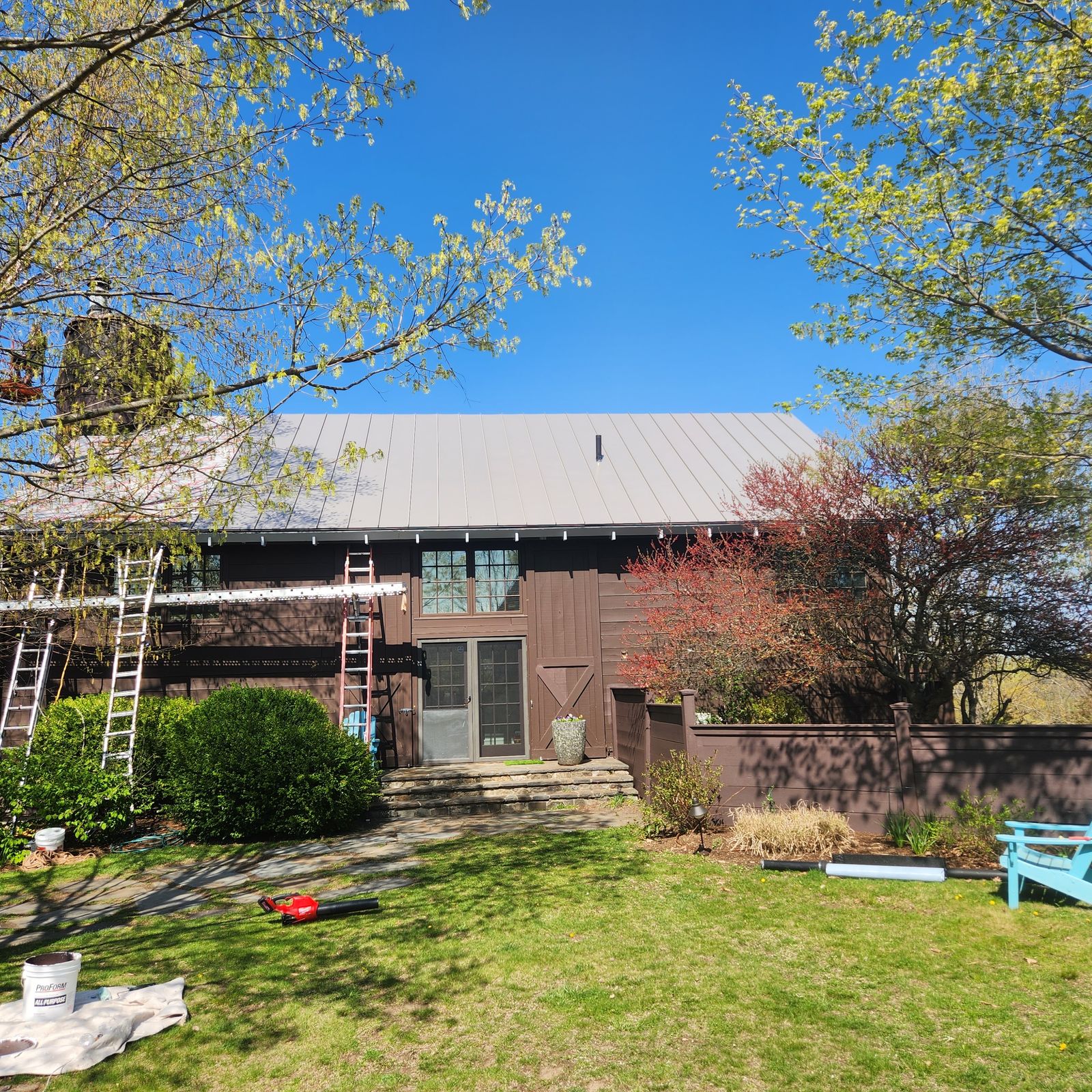 The same barn home finished with a new standing seam metal roof